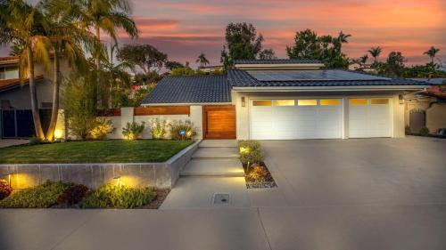 Mission Viejo House | Spanish-Inspired Mission Viejo Home with Courtyard Firepit Backyard Dining Casa Cordero by AvantStay