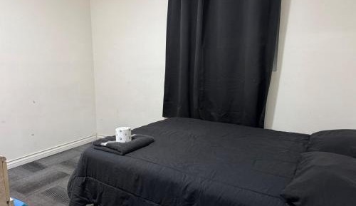 Queen Room with Shared Bathroom